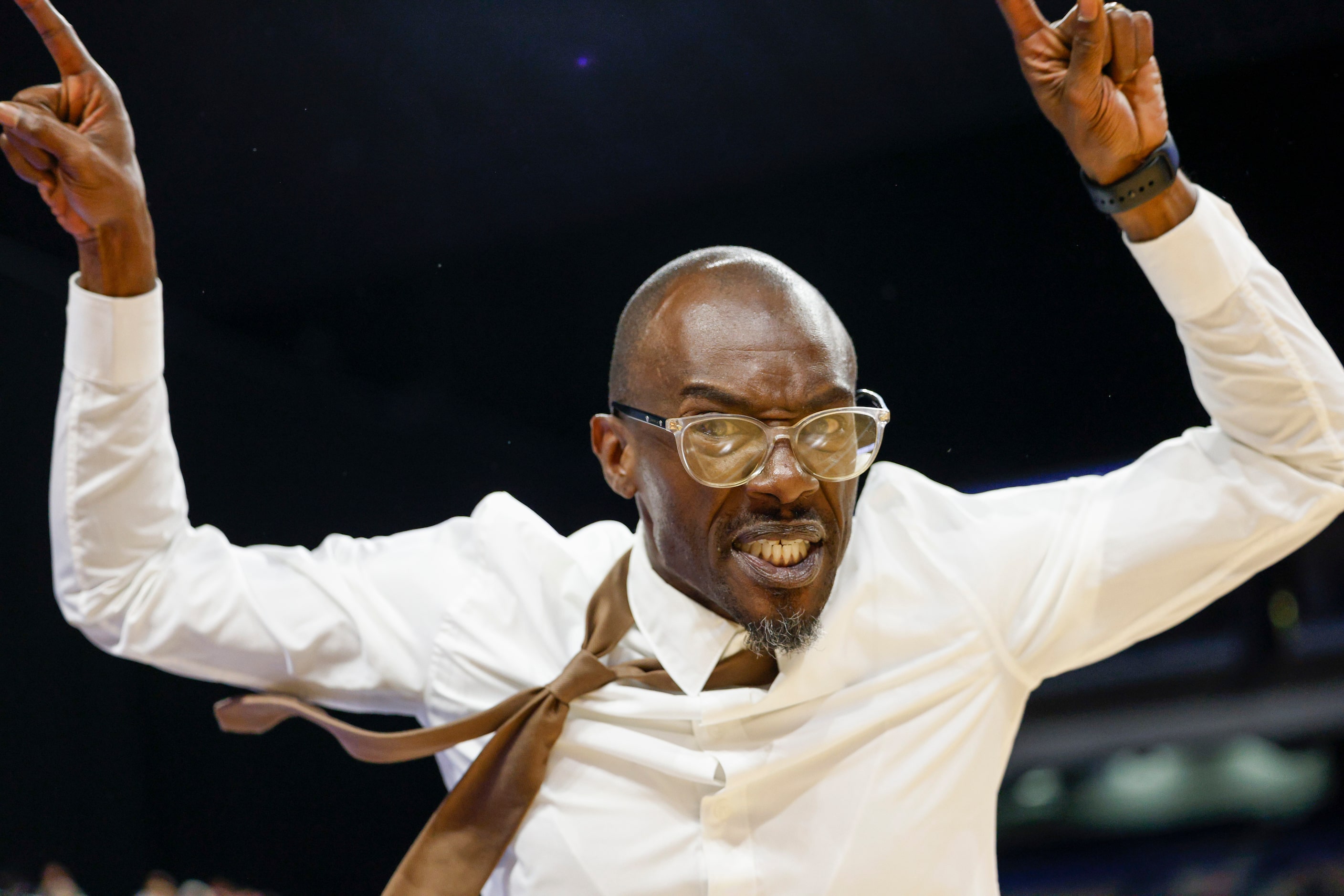 Madison head coach Damien Mobley celebrates winning the Class 3A state championship game...