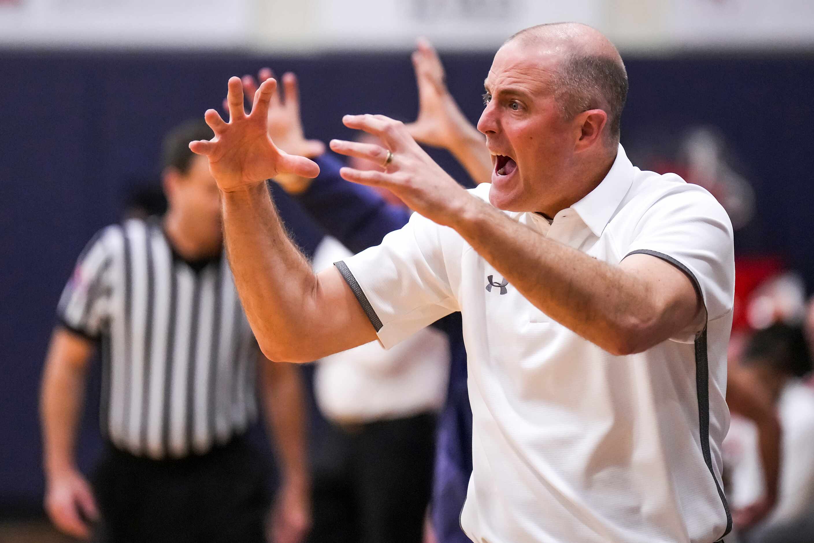 Prestonwood Christian head coach Jeff Clarkson looks for a call during a high school...