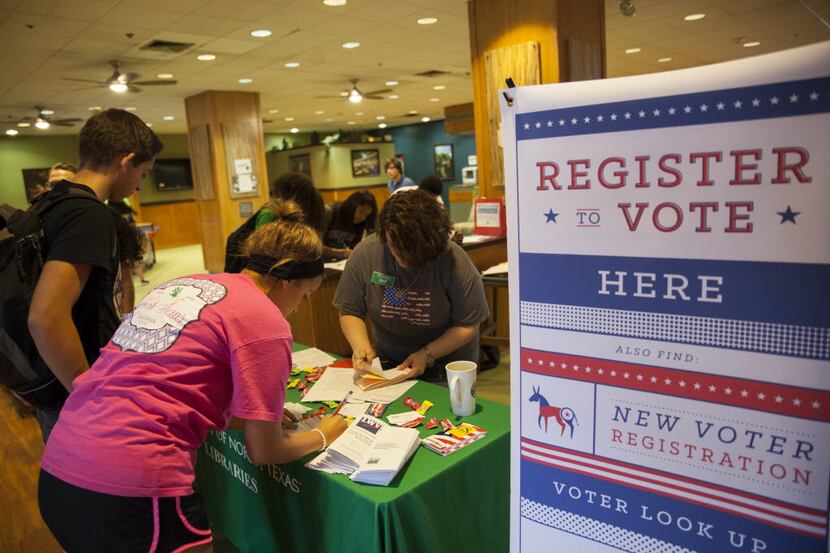 Students register to vote in Kerr Hall on the UNT campus in Denton.