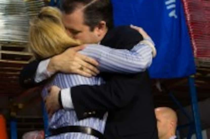  Sen. Ted Cruz hugged his wife, Heidi at a campaign stop Friday in Oshkosh, Wis., before he...