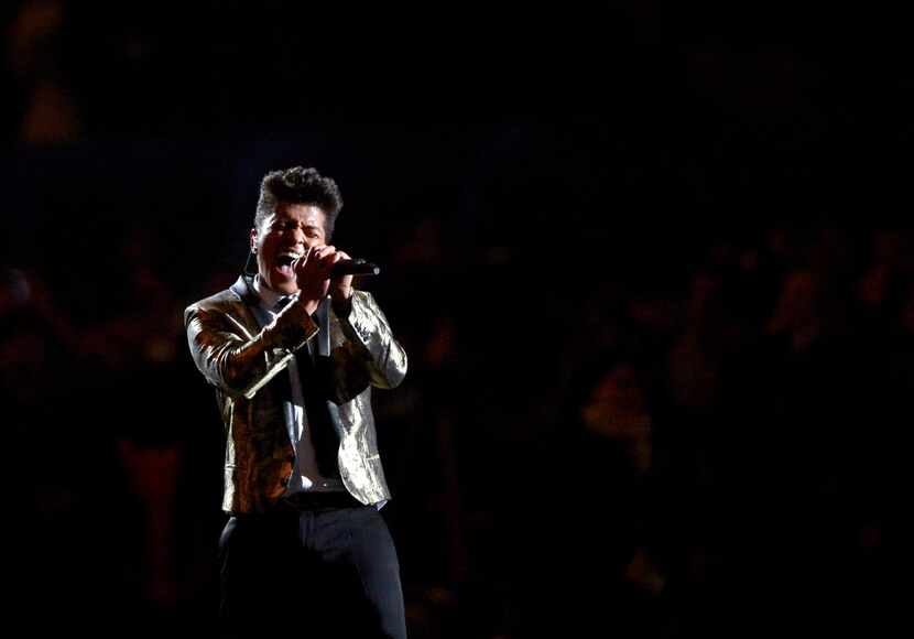 FILE - In this Feb. 2, 2014 file photo, Bruno Mars performs during the halftime show of the...
