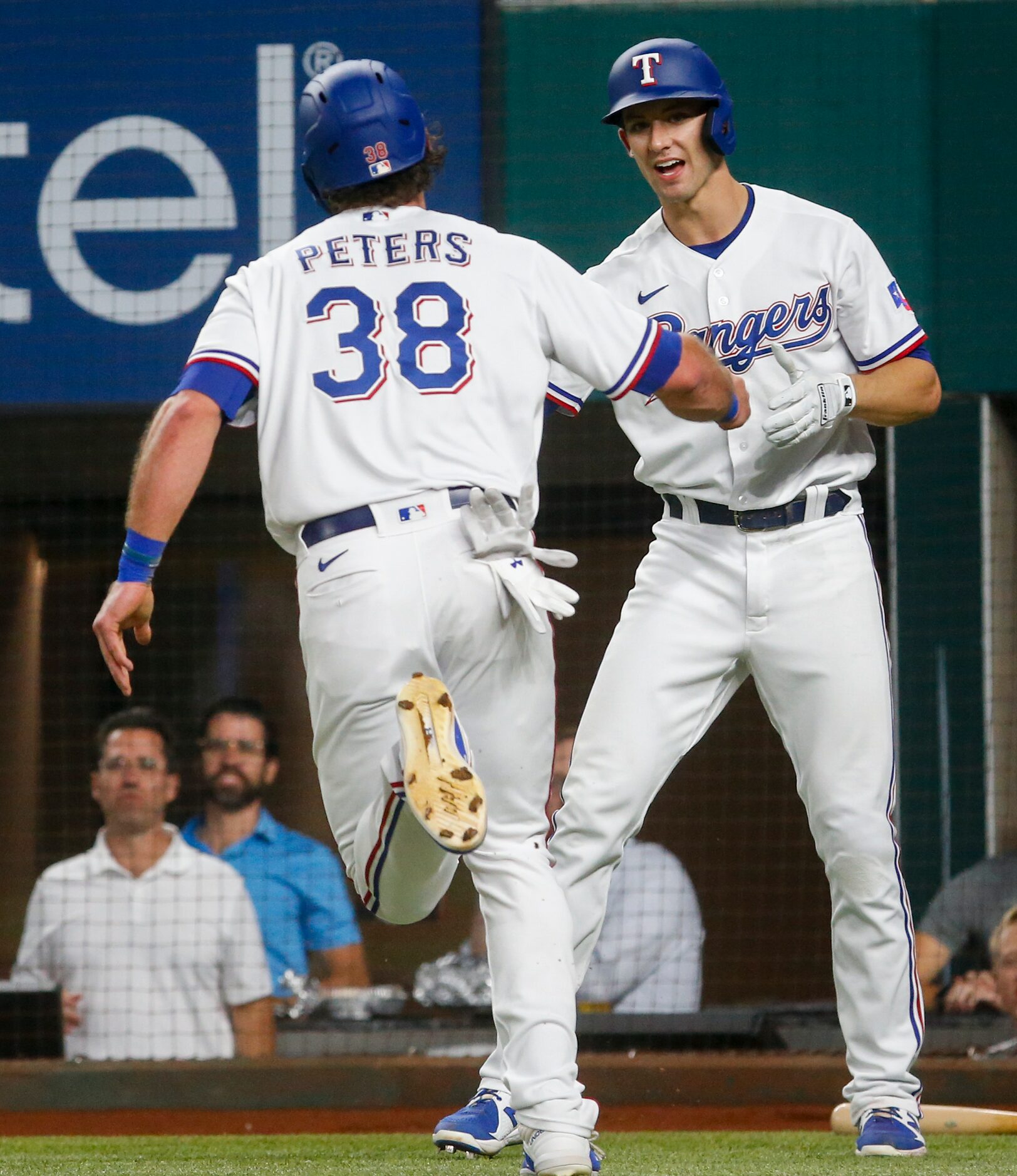 Texas Rangers center fielder DJ Peters (38) runs in to home following Texas Rangers first...