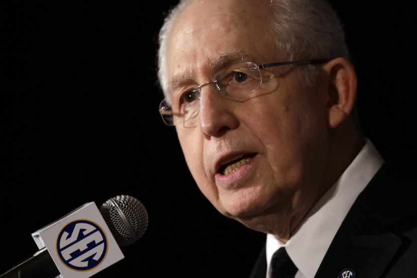 FILE - In this July 16, 2013 file photo, Southeastern Conference Commissioner Mike Slive...