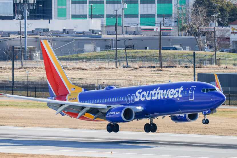 Southwest Airlines plane arrives to the Dallas Love Field in Dallas on Thursday, Jan. 19,...