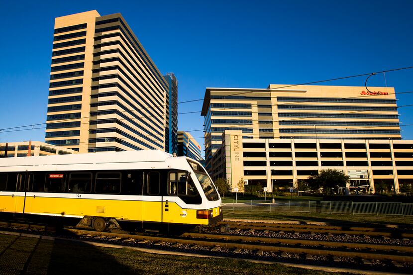 The DART Red Line train departs the Bush Turnpike Station at the CityLine development in...