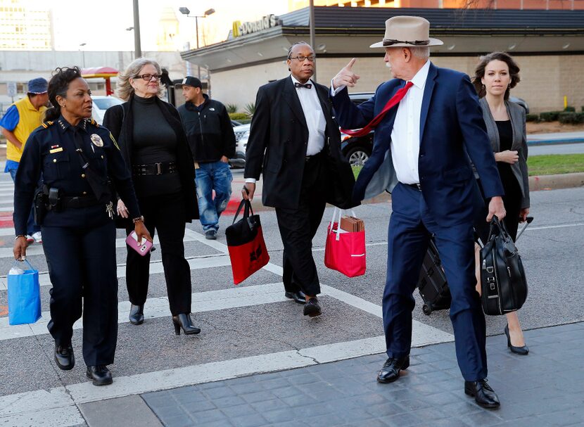 Dallas County Commissioner John Wiley Price (third from right) arrived  for the first day of...