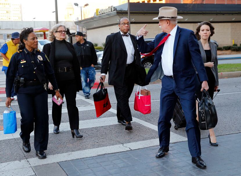 Dallas County Commissioner John Wiley Price (third from right) arrived  for the first day of...