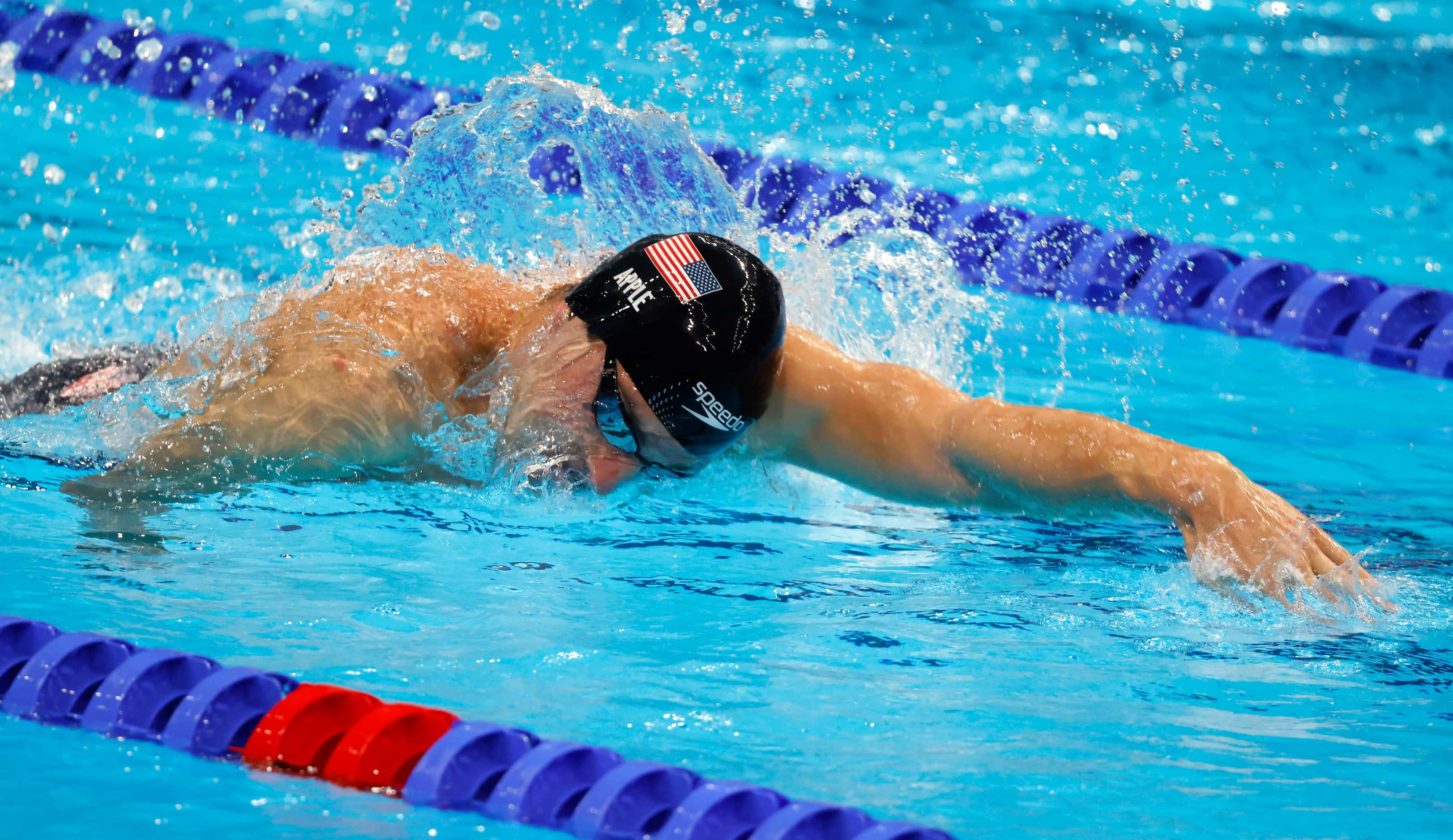 USA’s Zach Apple competes in the men’s 4x100 meter medley relay final during the postponed...