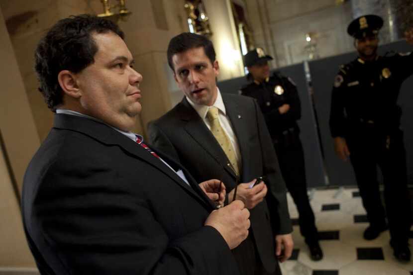 Rep. Blake Farenthold,left, has called for congressional hearings on the AT&T-Time Warner...