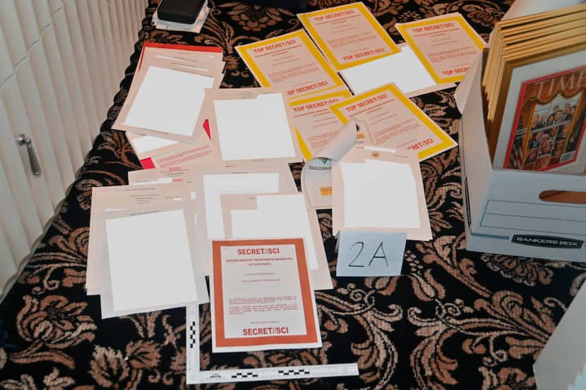 This Justice Department image shows documents seized during the Aug. 8, 2022, FBI search of...