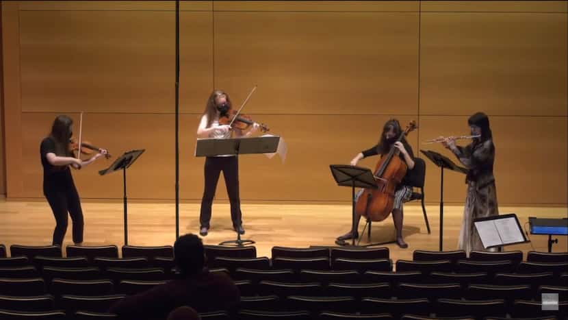 Violinist Mia Detwiler, violist Kathleen Crabtree, cellist Kourtney Newton and flutist and...