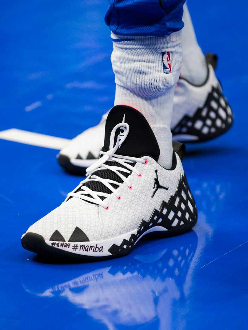 Dallas Mavericks guard Luka Doncic (77) has the word "Mamba" written on his left sneaker in...