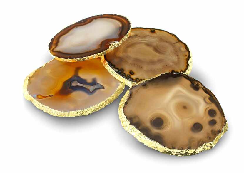 
Edged in 24-carat gold or silver, these distinctive agate coasters are perfect for...
