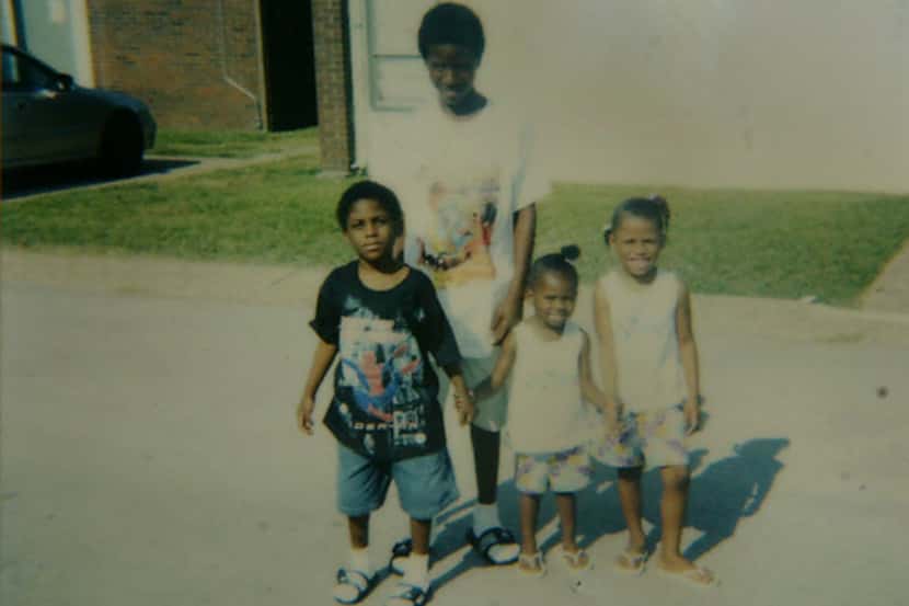 Davontae Williams (left) is seen in this undated photo with his sisters, Alicia Williams and...