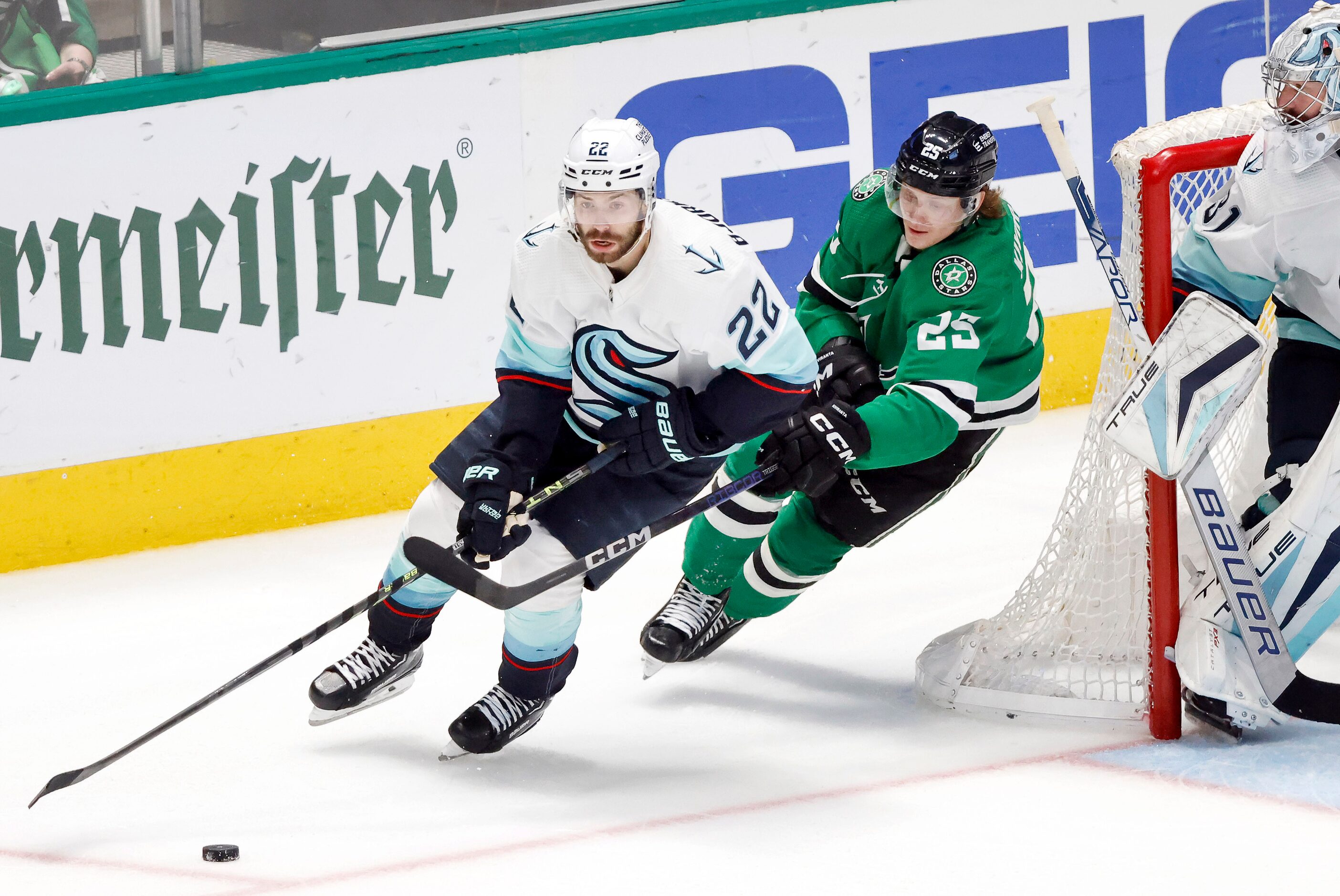 Dallas Stars left wing Joel Kiviranta (25) give chase to Seattle Kraken right wing Oliver...