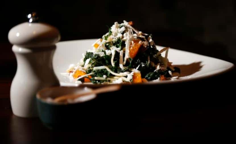 
A salad of julienned Tuscan kale and celery root is shot through with mandarins, sunchoke...