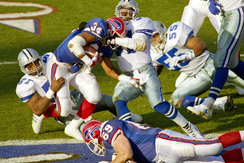 FILE - In this Jan. 31, 1993, file photo, Buffalo Bills' Thurman Thomas drives in for a...