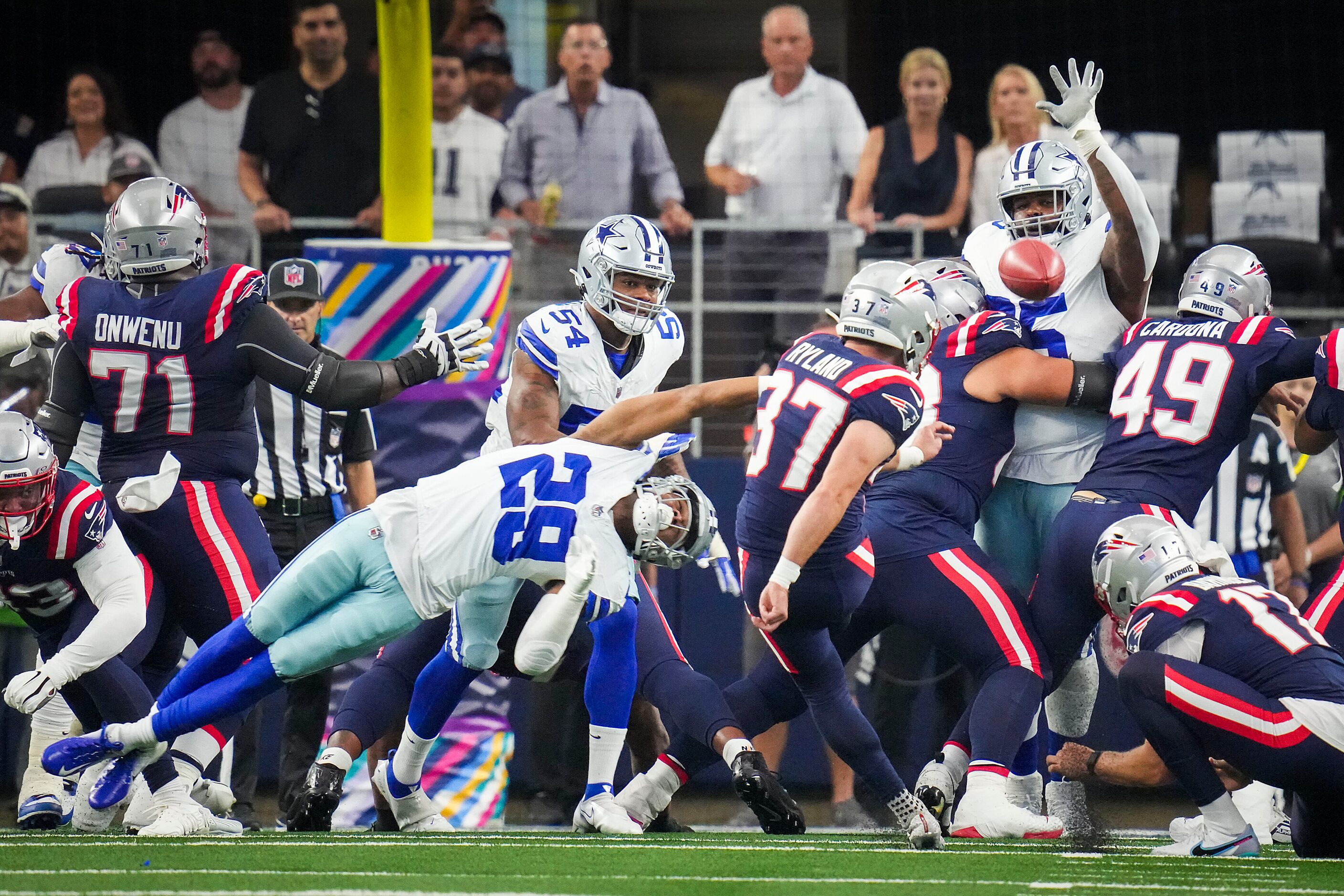 New England Patriots place kicker Chad Ryland (37) kicks a field goal over Dallas Cowboys...