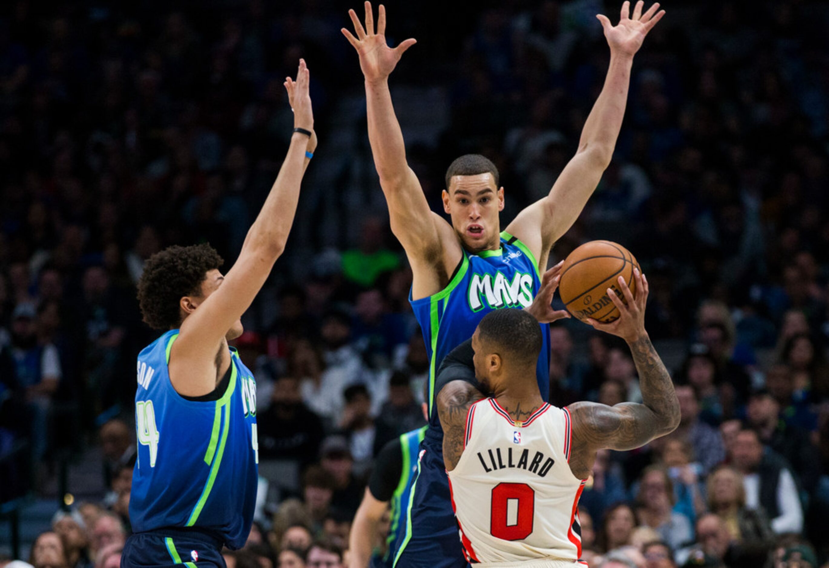 Dallas Mavericks forward Justin Jackson (44) and forward Dwight Powell (7) defend against...