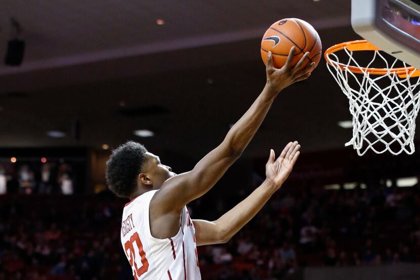 Oklahoma guard Kameron McGusty (20) shoots in the second half of an NCAA college basketball...