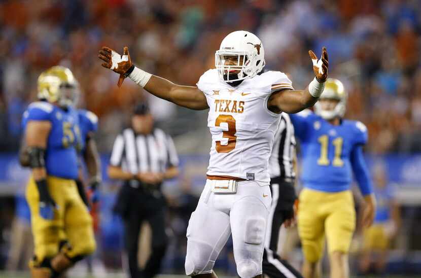 Texas Longhorns linebacker Jordan Hicks (3) reacts to being penalized for pass interference...