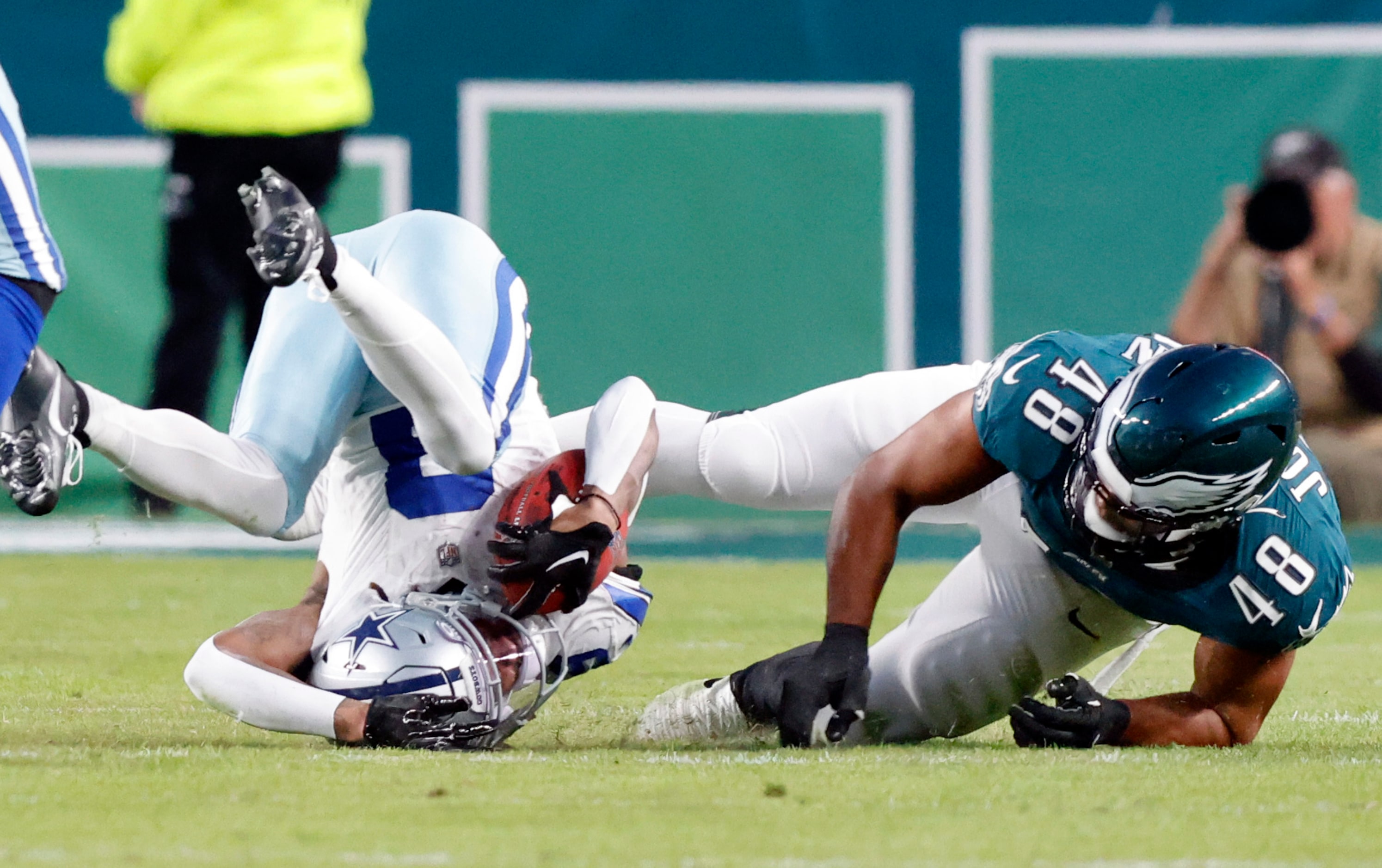 Philadelphia Eagles linebacker Patrick Johnson (48) crushes Dallas Cowboys wide receiver...