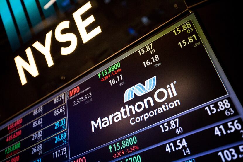 Marathon Oil Corp. signage is displayed on a monitor on the floor of the New York Stock...
