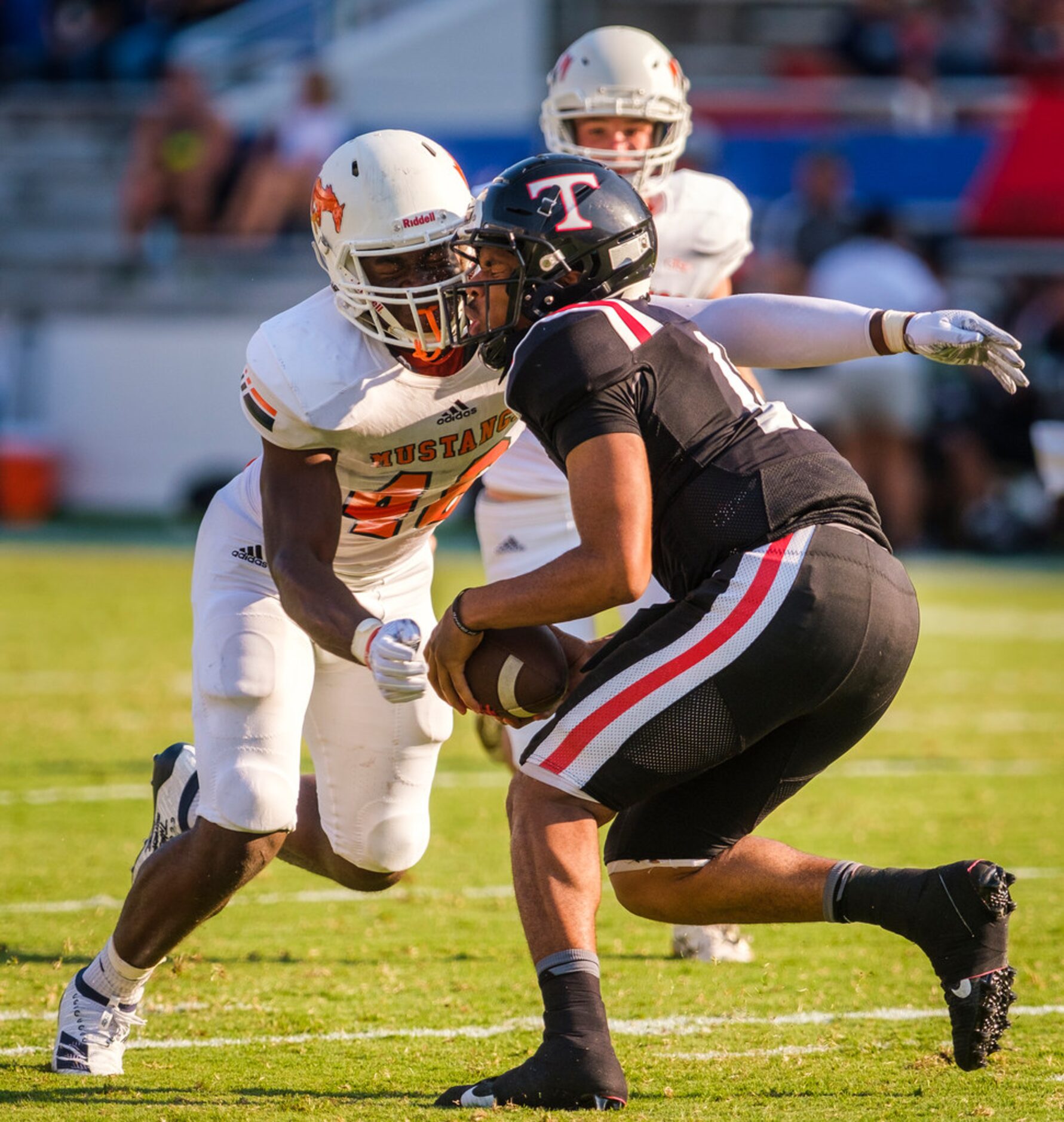 Sachse defensive lineman Anthony Anyanwu (46) sacks Euless Trinity quarterback Marcus Ervin...