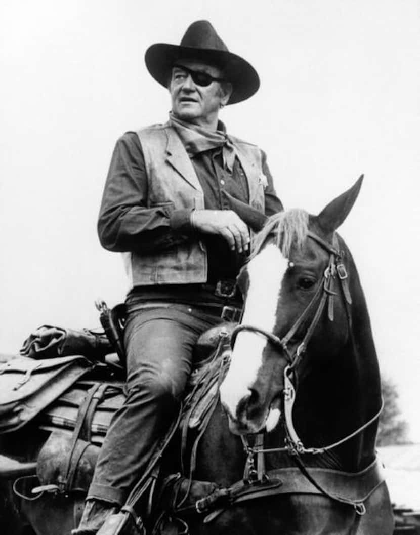 
This 1969 photo released by Paramount Pictures shows John Wayne in a scene from the movie...