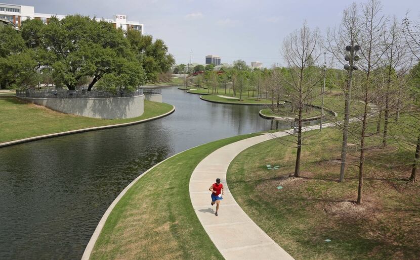 Farmers Branch creek flows though Vitruvian Park in Addison, Texas. The creek is a point of...