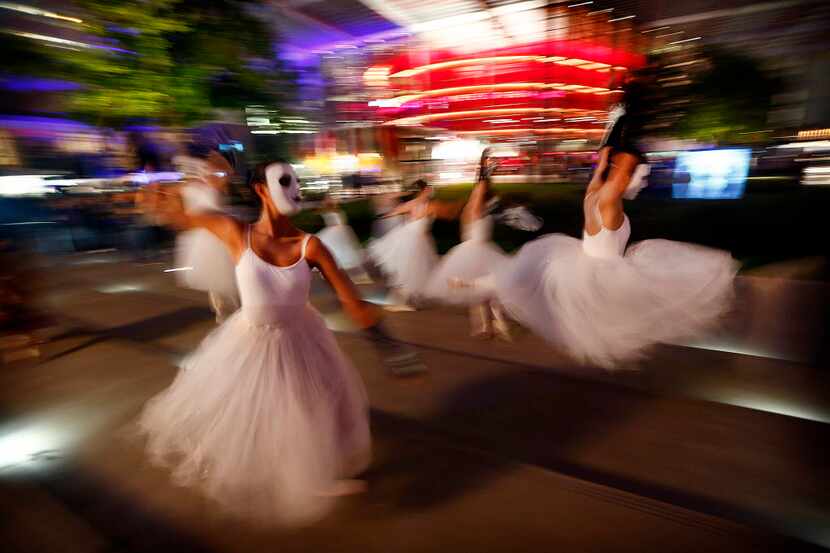 Girls from Hathaway Academy of Ballet perform in front of the Winspear Opera House during...