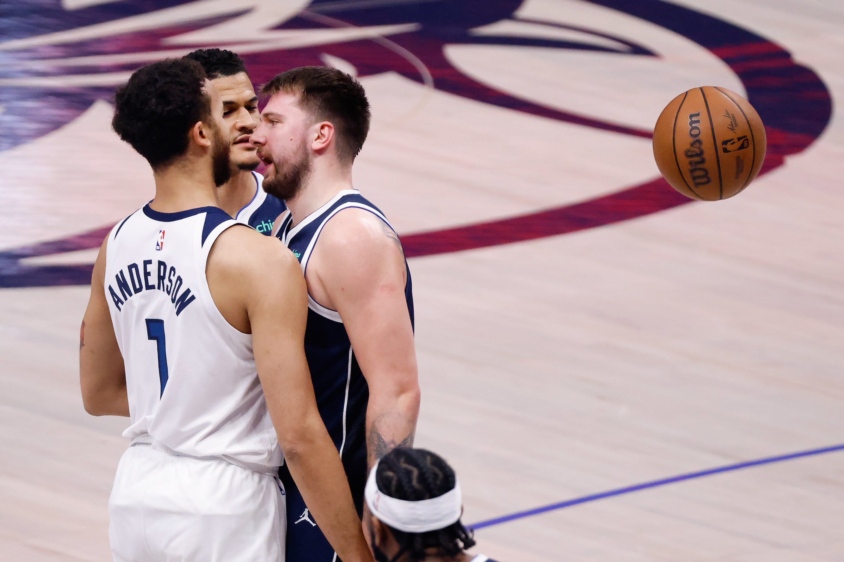 Dallas Mavericks guard Luka Doncic (77) gets in the face of is Minnesota Timberwolves...