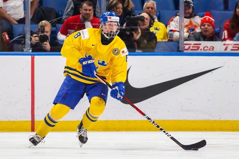 FILE - In this Dec. 31, 2017, file photo, Sweden's Rasmus Dahlin skates during the second...