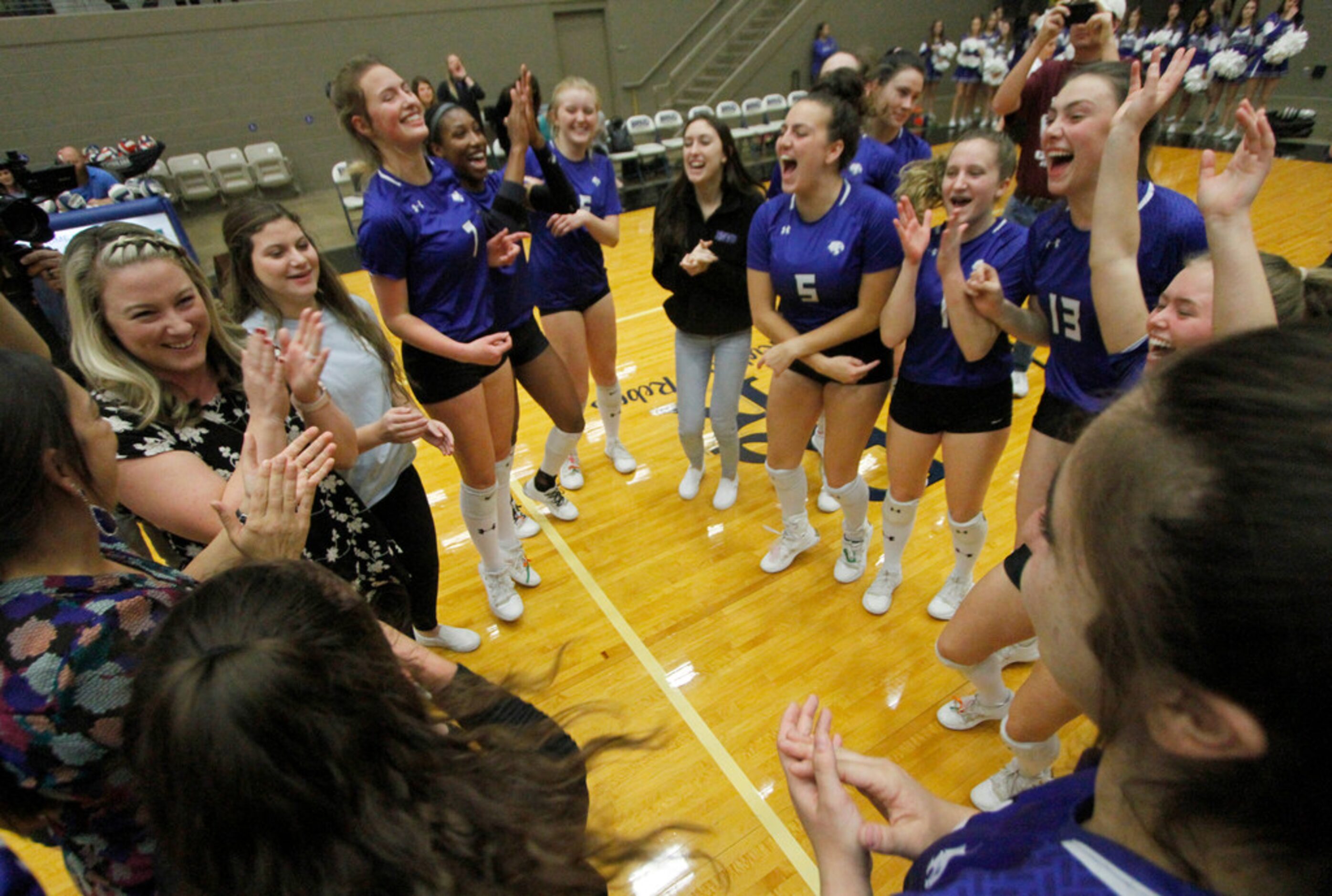 Trophy Club Byron Nelson head volleyball coach Brianne Barker-Groth, far left, celebrates...