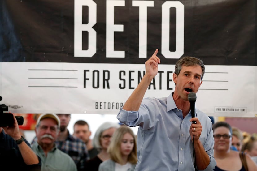 Congressman Beto O'Rourke speaks to supporters during a town hall at the Historic Santa Fe...