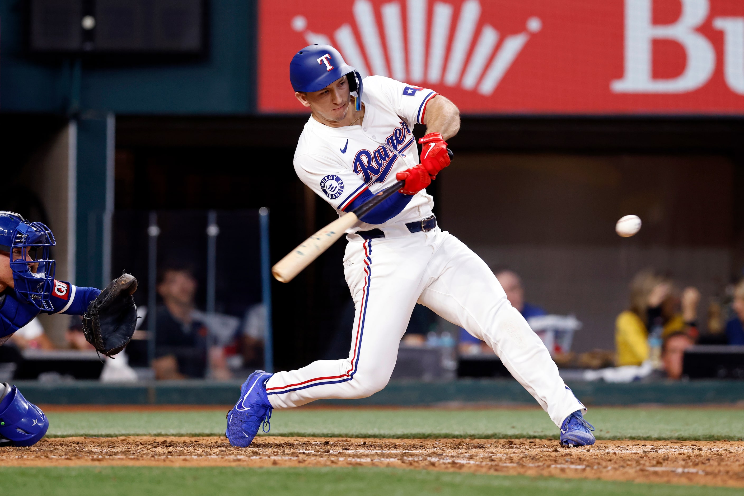 Texas Rangers left fielder Wyatt Langford (36) hits his first career grand slam off Kansas...