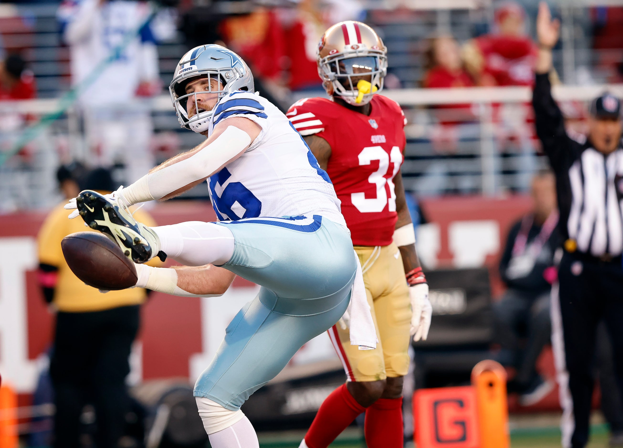 Dallas Cowboys tight end Dalton Schultz (86) looks to spike the ball after scoring a second...