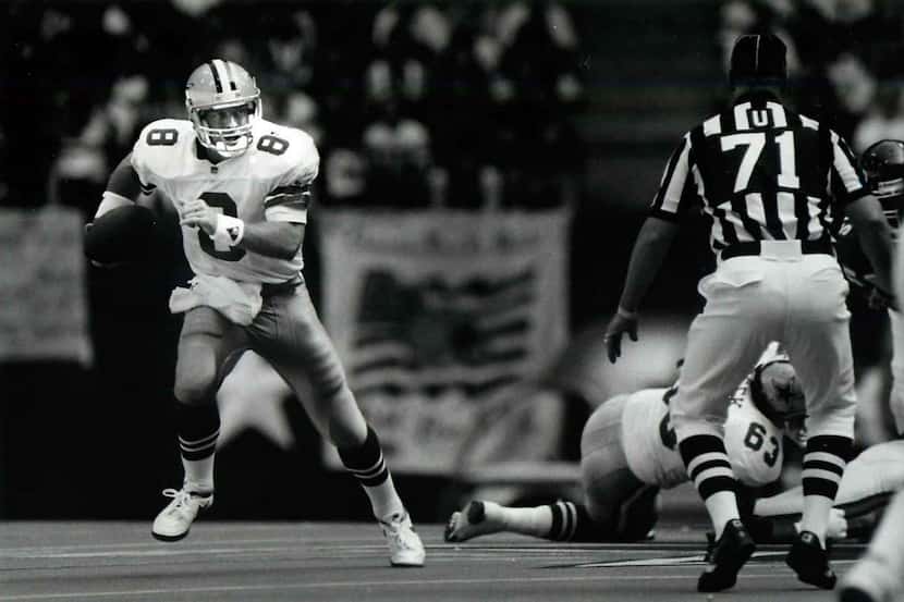 FILE - Troy Aikman is pictured above playing for the Dallas Cowboys on Oct. 10, 1992,...