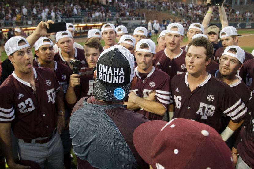 Texas A&M coach Rob Childress, center, address his team after a 12-6 win over Davidson in an...