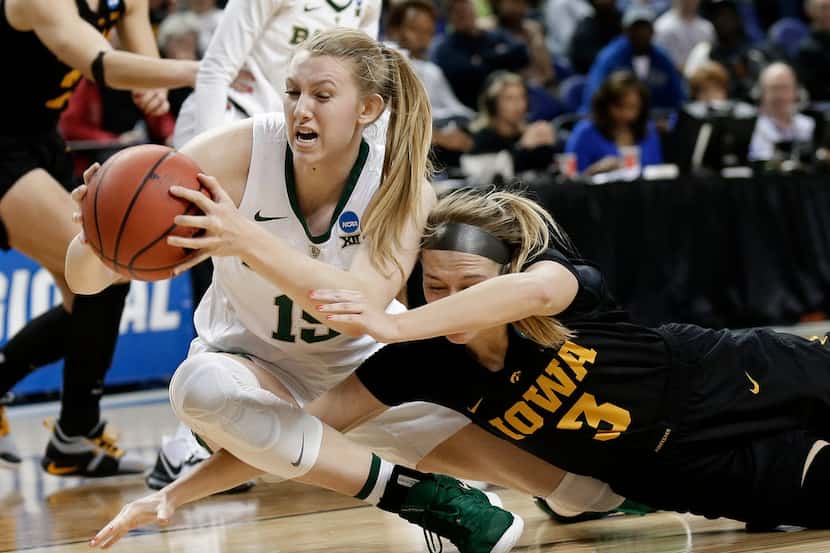 Baylor's Lauren Cox (15) steals the ball from Iowa's Makenzie Meyer (3) during the second...