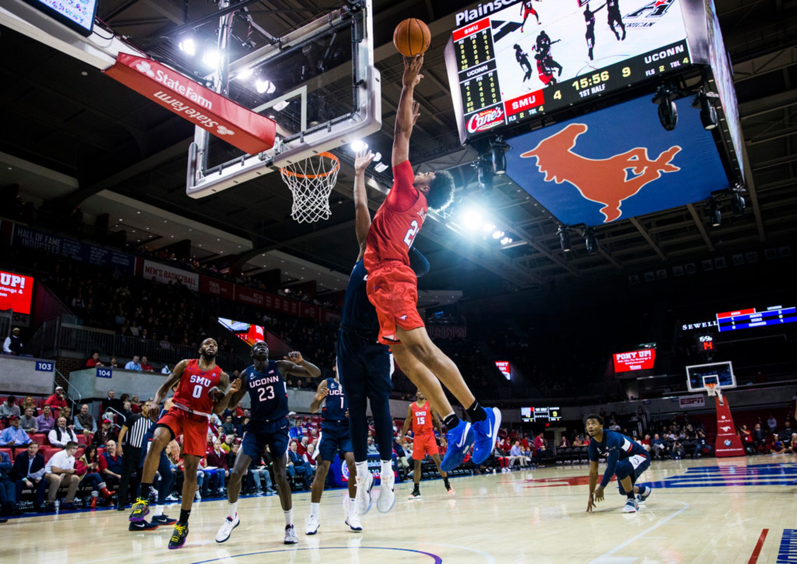 Southern Methodist Mustangs forward Isiah Jasey (22) and Connecticut Huskies center Josh...