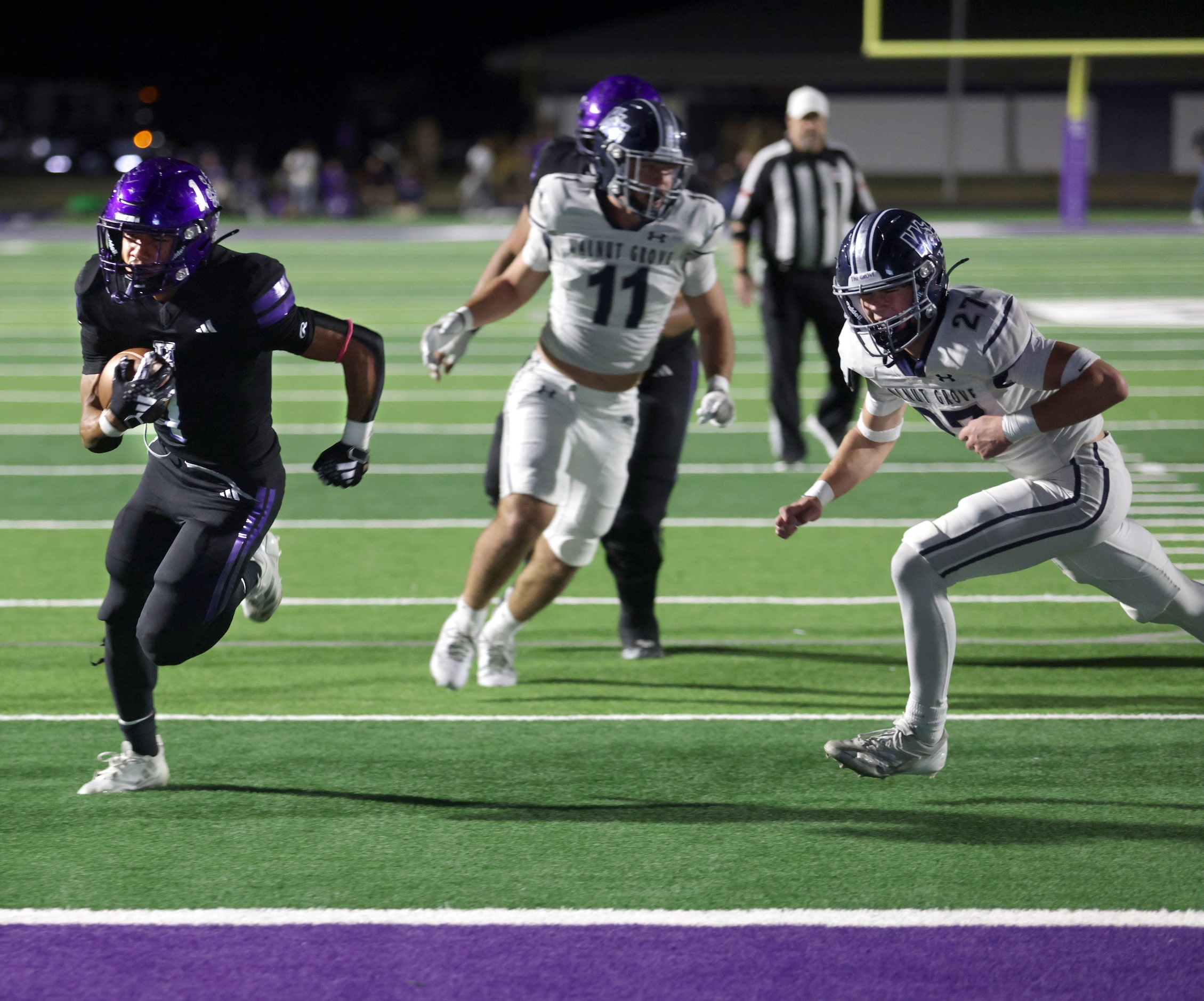 Anna player #1 Edward Chumley runs the ball for a touchdown during the Prosper Walnut Grove...