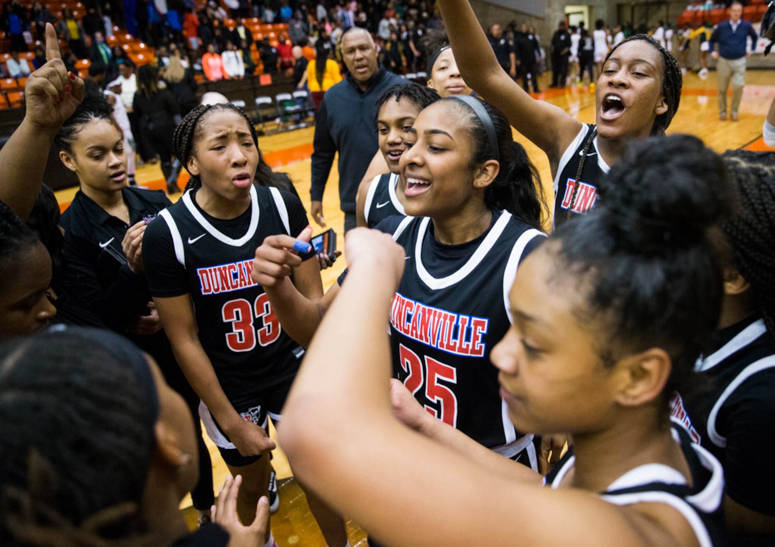 Duncanville celebrates a 47-43 win after a Class 6A Region I quarterfinal girls basketball...