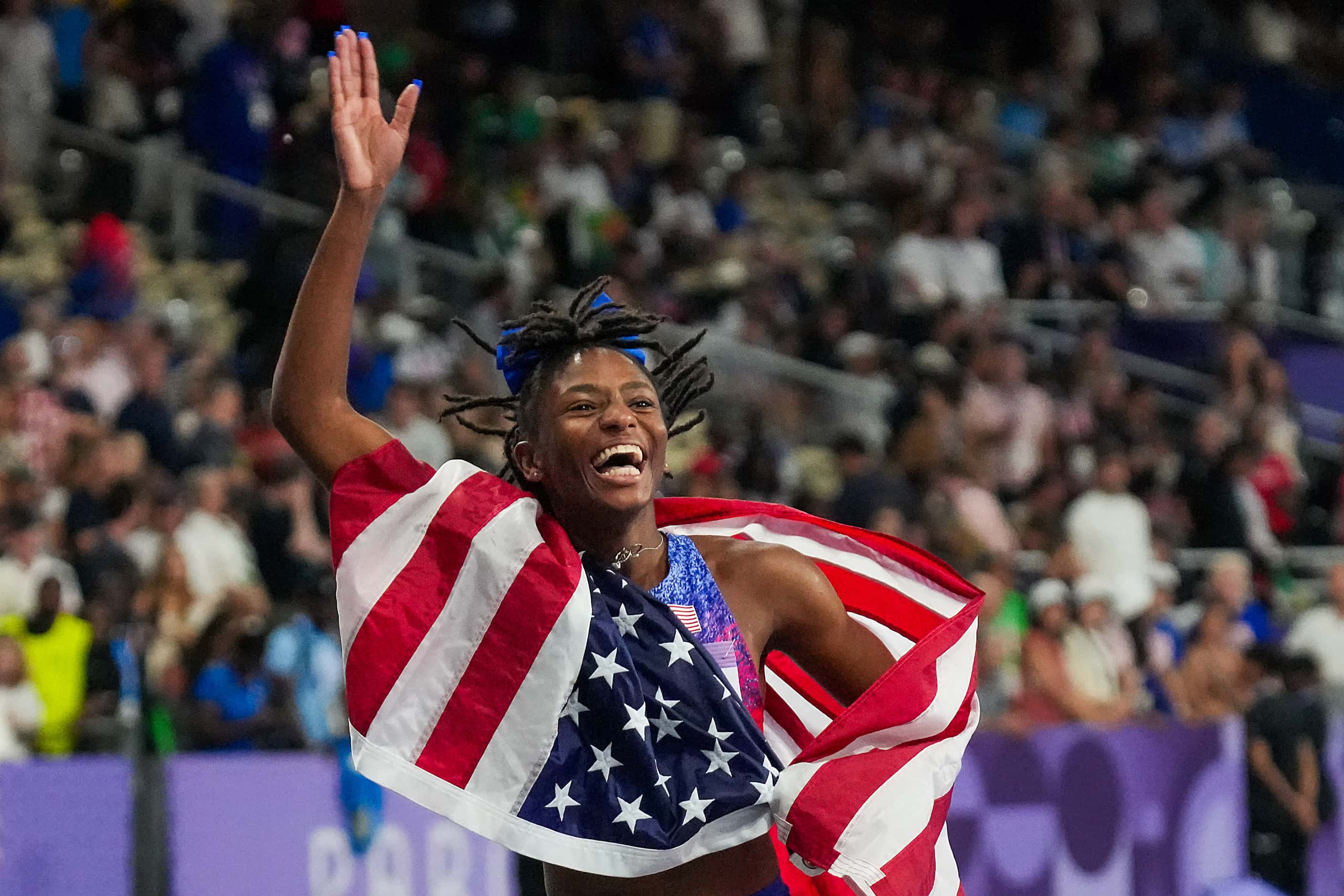 Bronze medalist Melissa Jefferson of the United States celebrates after the women's...