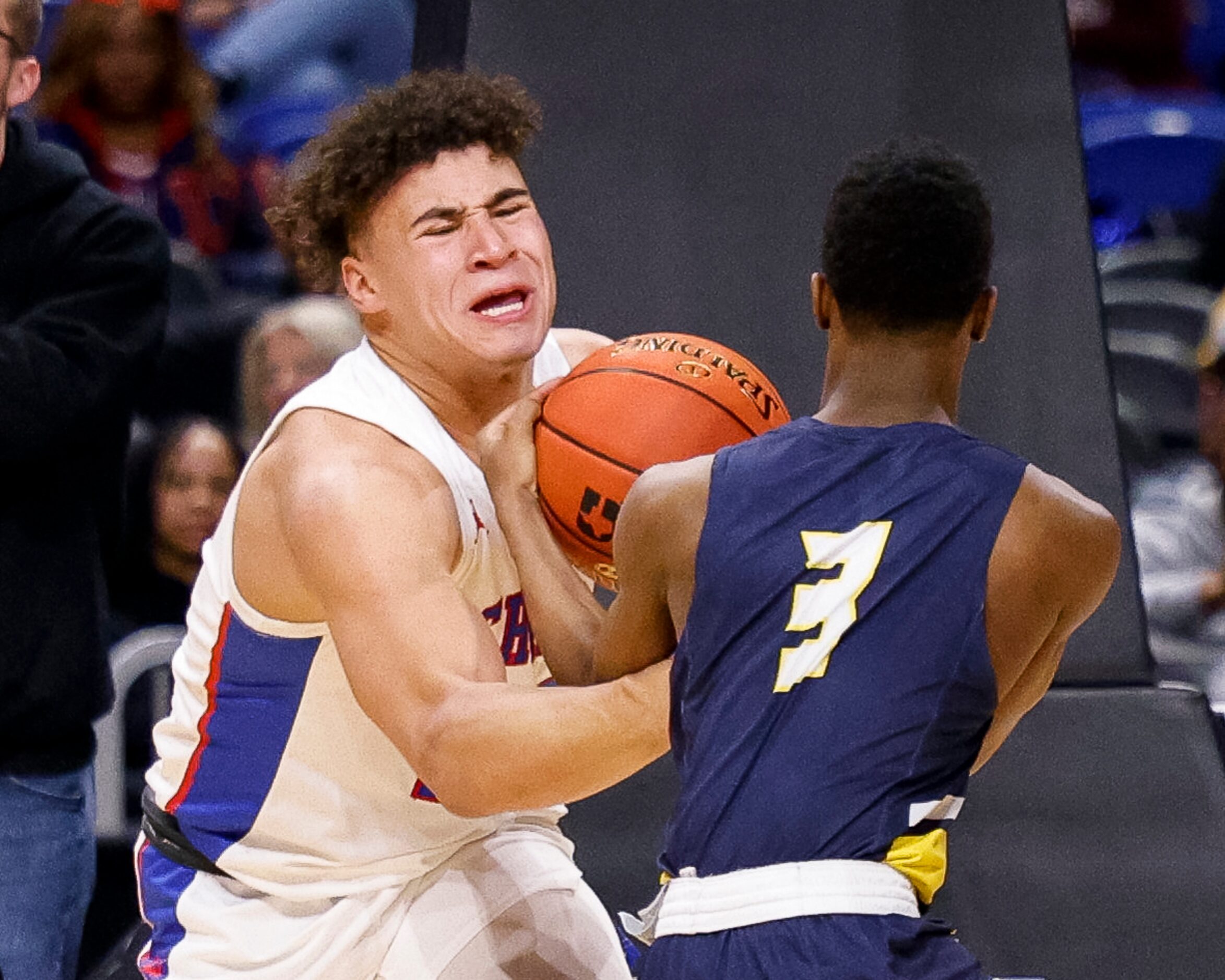 Austin Westlake guard Jaden Greathouse (23) and McKinney guard Jacovey Campbell (3) wrestle...