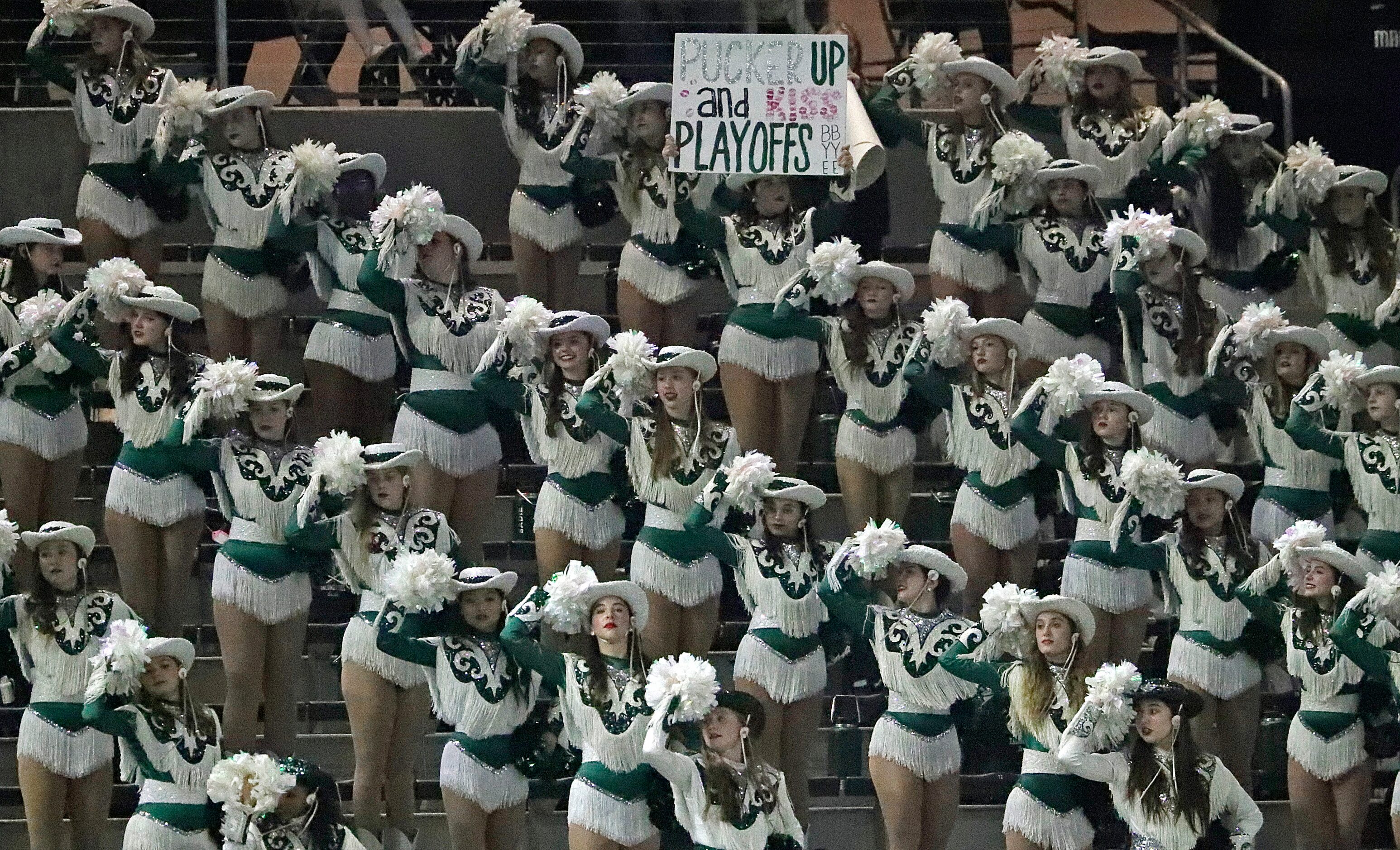 The Prosper High School Talonettes perform during the first half as North Crowley High...