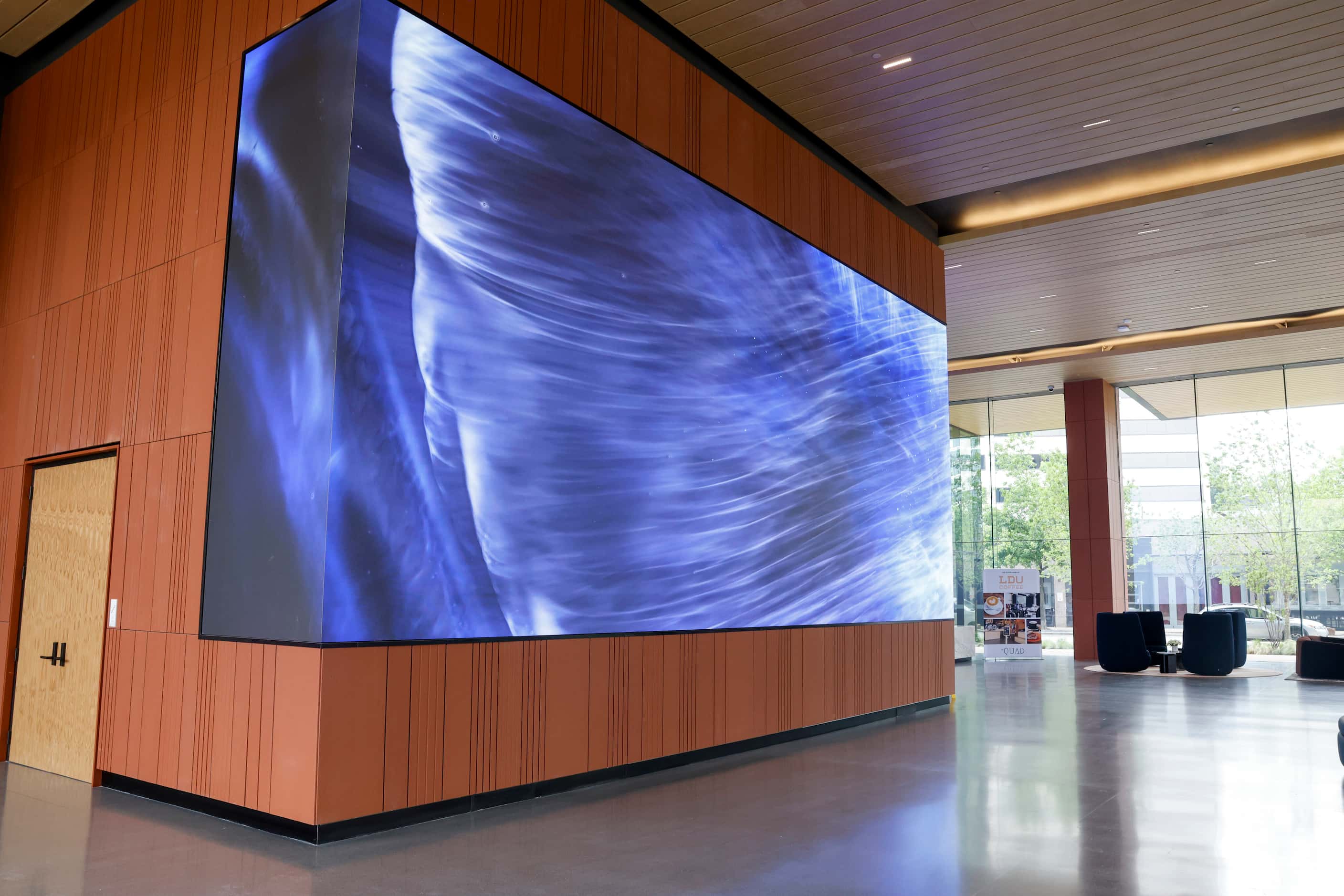 The lobby of the building holds Texas' largest indoor high-resolution digital art installation.