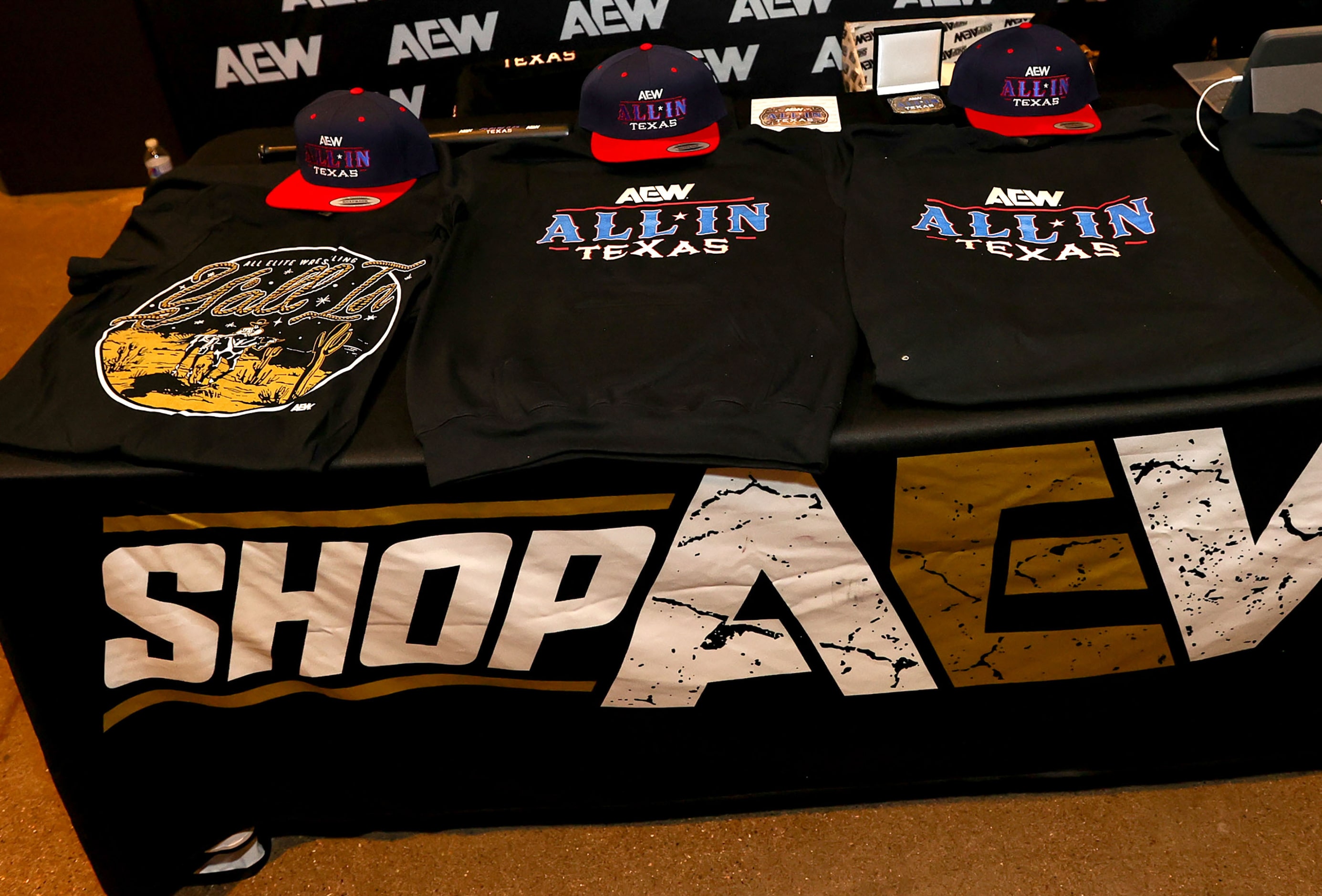 Shirts and hats for the All Elite Wrestling kickoff party on Wednesday, November 20, 2024 at...