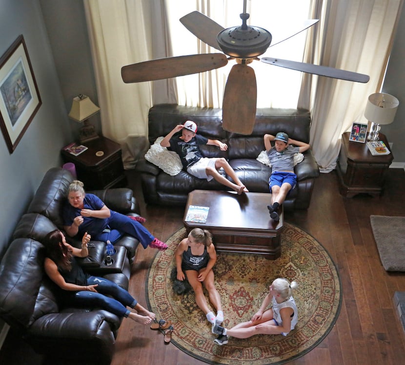 Gymnast Ragan Smith and her family and friends hang out together in the living room at her...
