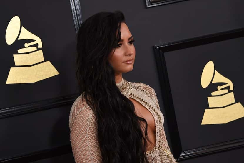 Demi Lovato arrives for the 59th Grammy Awards on February 12, 2017, in Los Angeles,...